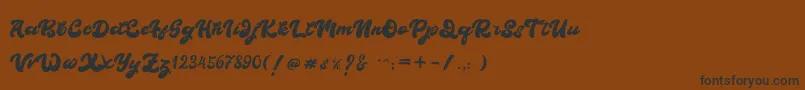 BOLDIE-Schriftart – Schwarze Schriften auf braunem Hintergrund