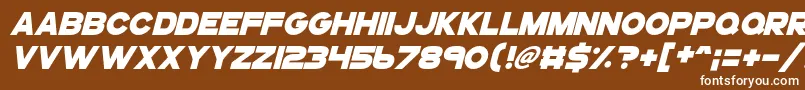 Gogoposterpunchitalic-fontti – valkoiset fontit ruskealla taustalla