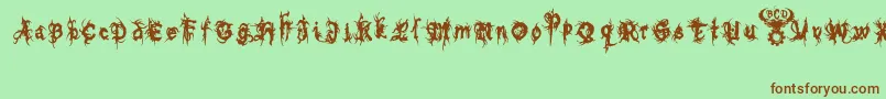 フォントbolt cutter nasty – 緑の背景に茶色のフォント