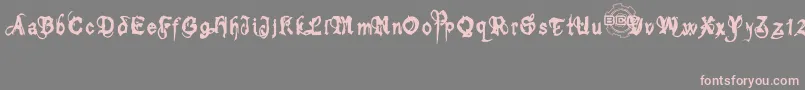 bolt cutter-Schriftart – Rosa Schriften auf grauem Hintergrund