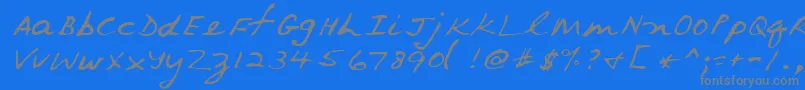 フォントVanRegular – 青い背景に灰色の文字