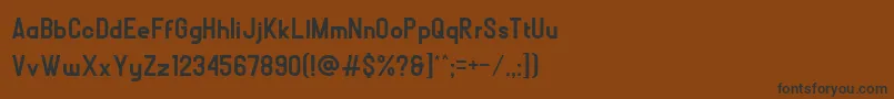 フォントBOLР’D – 黒い文字が茶色の背景にあります