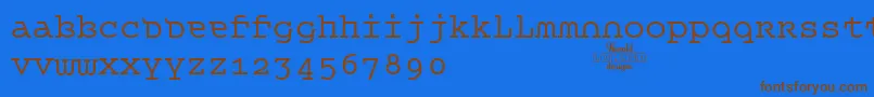 フォントQueerTheoryRegulartrial – 茶色の文字が青い背景にあります。