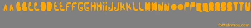 フォントbooblr by Thunderpanda 1 02 – オレンジの文字は灰色の背景にあります。