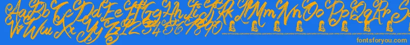 フォントBooday – オレンジ色の文字が青い背景にあります。