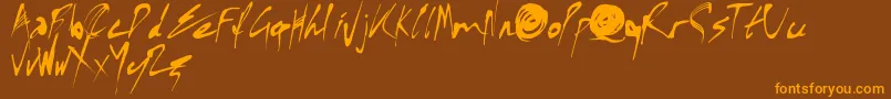 X Font Font – Orange Fonts on Brown Background