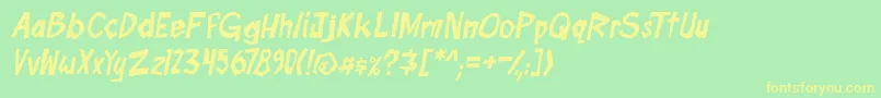 フォントboomtankPG ital – 黄色の文字が緑の背景にあります
