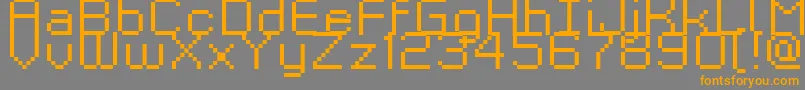 Czcionka GrixelKyrou9RegularXtnd – pomarańczowe czcionki na szarym tle
