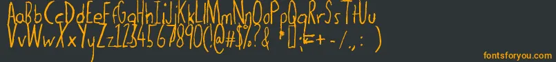Шрифт Thedogatemyhomework – оранжевые шрифты на чёрном фоне
