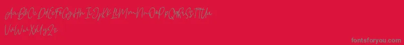 Borgemore-fontti – harmaat kirjasimet punaisella taustalla