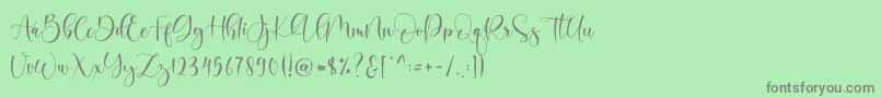 フォントBoshela – 緑の背景に灰色の文字