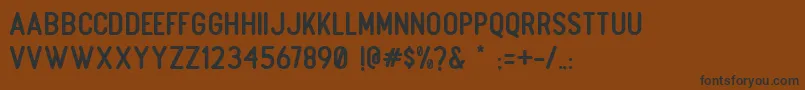 Boulder Regular Font – Black Fonts on Brown Background