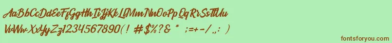 BOULEVARD SCRIPT-fontti – ruskeat fontit vihreällä taustalla