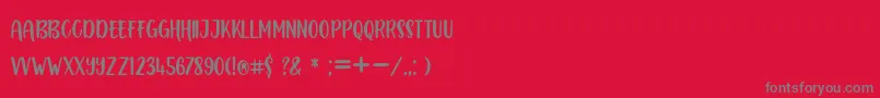 BOUSTOWN SANS-Schriftart – Graue Schriften auf rotem Hintergrund