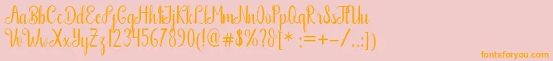 Boutique Free Font – Orange Fonts on Pink Background