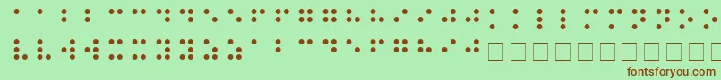 BRAILLE-Schriftart – Braune Schriften auf grünem Hintergrund