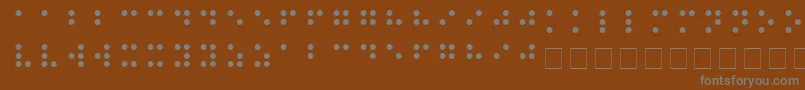 BRAILLE-Schriftart – Graue Schriften auf braunem Hintergrund