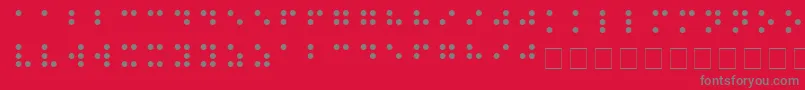 BRAILLE-Schriftart – Graue Schriften auf rotem Hintergrund