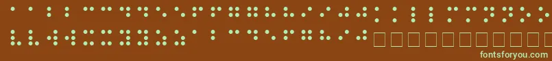 フォントBRAILLE – 緑色の文字が茶色の背景にあります。