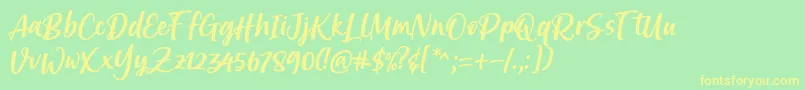 フォントBrastagi Font by 7NTypes – 黄色の文字が緑の背景にあります