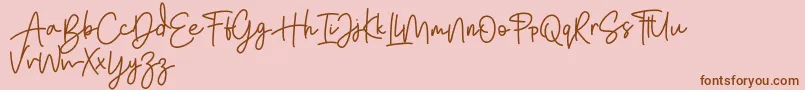 Bratarini FREE-Schriftart – Braune Schriften auf rosa Hintergrund