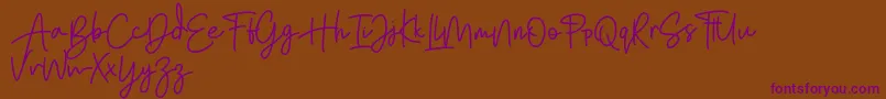 Bratarini FREE Font – Purple Fonts on Brown Background