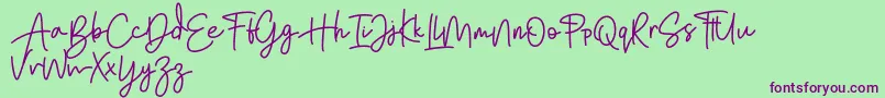 Bratarini FREE Font – Purple Fonts on Green Background