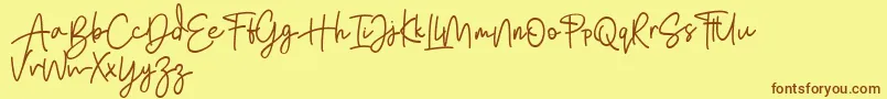 Bratarini FREE Font – Brown Fonts on Yellow Background