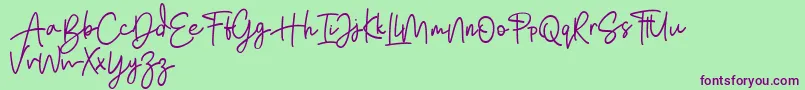 Bratarini FREE Font – Purple Fonts on Green Background