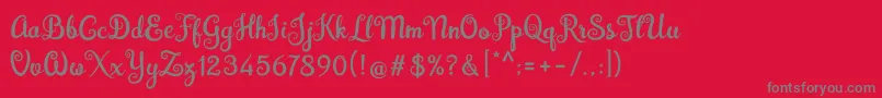 Fonte Brazilian Script Fill – fontes cinzas em um fundo vermelho