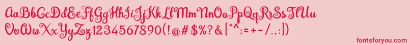 フォントBrazilian Script Fill – ピンクの背景に赤い文字