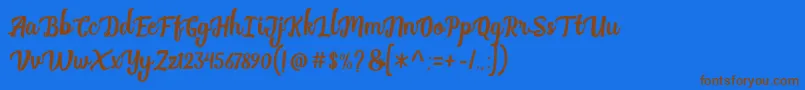 フォントBreak Stones   Free Personal Use – 茶色の文字が青い背景にあります。