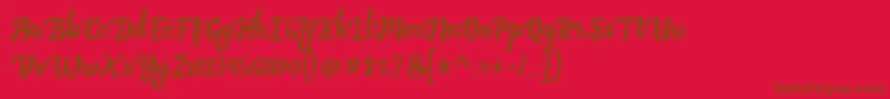 フォントBreak Stones   Free Personal Use – 赤い背景に茶色の文字