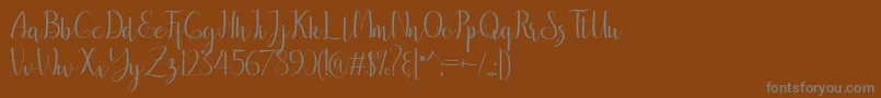 フォントbreathaking – 茶色の背景に灰色の文字