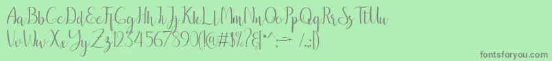 フォントbreathaking – 緑の背景に灰色の文字