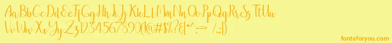 フォントbreathaking – オレンジの文字が黄色の背景にあります。