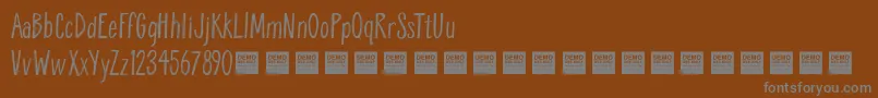 Шрифт Breathe Easy   Demo – серые шрифты на коричневом фоне