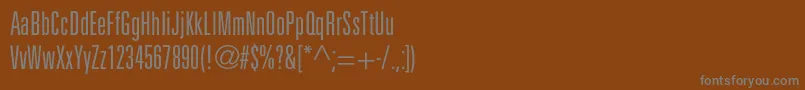 フォントUnicumcondlightc – 茶色の背景に灰色の文字