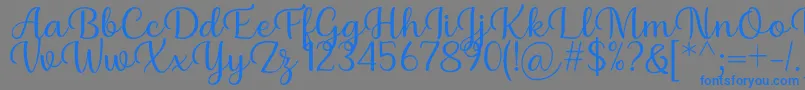 フォントBriany Font Regular by Andrian 7NTypes – 灰色の背景に青い文字