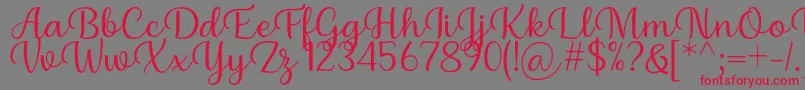 Шрифт Briany Font Regular by Andrian 7NTypes – красные шрифты на сером фоне