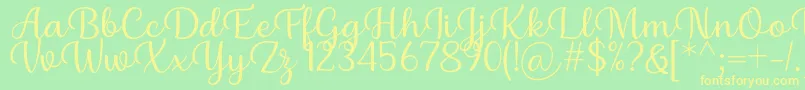 Шрифт Briany Font Regular by Andrian 7NTypes – жёлтые шрифты на зелёном фоне