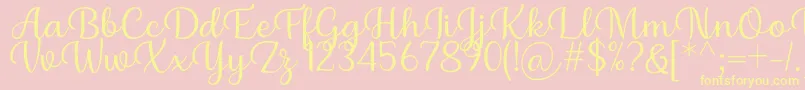 Briany Font Regular by Andrian 7NTypes-fontti – keltaiset fontit vaaleanpunaisella taustalla