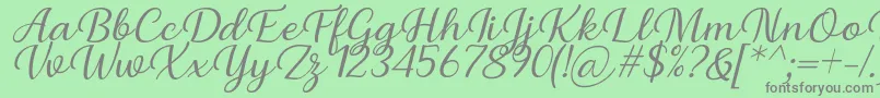 フォントBriany Font Regular Italic by Andrian 7NTypes – 緑の背景に灰色の文字