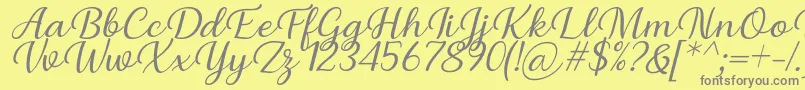 Шрифт Briany Font Regular Italic by Andrian 7NTypes – серые шрифты на жёлтом фоне