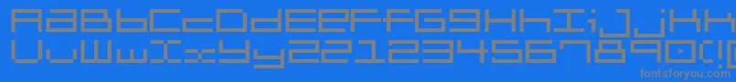 Brickle-fontti – harmaat kirjasimet sinisellä taustalla