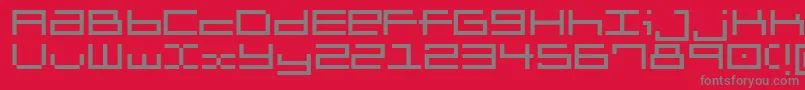 Brickle-fontti – harmaat kirjasimet punaisella taustalla