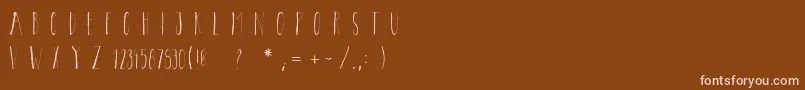 Czcionka Bricklebold – różowe czcionki na brązowym tle