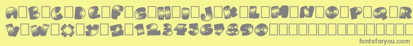 フォントBrightoon Plain – 黄色の背景に灰色の文字