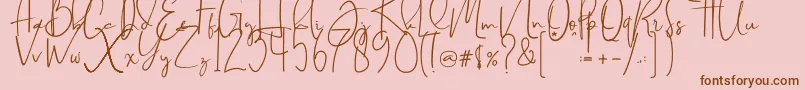 Fonte Brilliant signature  regular – fontes marrons em um fundo rosa