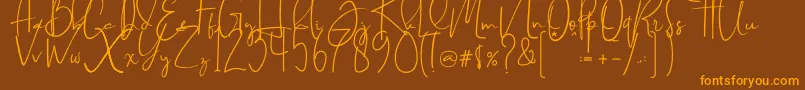 Brilliant signature  regular Font – Orange Fonts on Brown Background